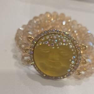 Elegant Gold and Crystal Sunface Bracelet